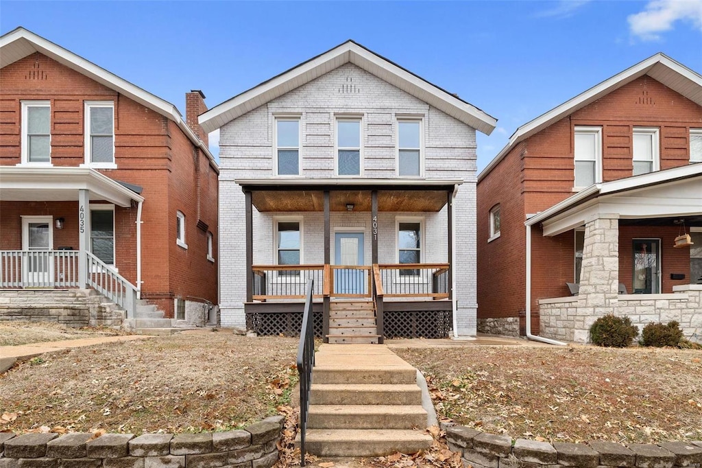 view of front of property featuring covered porch