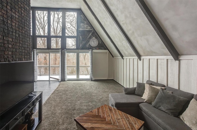 living room with light carpet, high vaulted ceiling, and beam ceiling