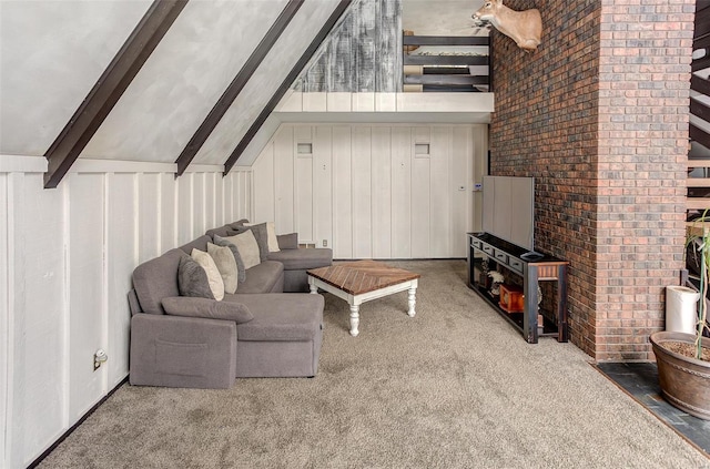 carpeted living room featuring beamed ceiling and a towering ceiling