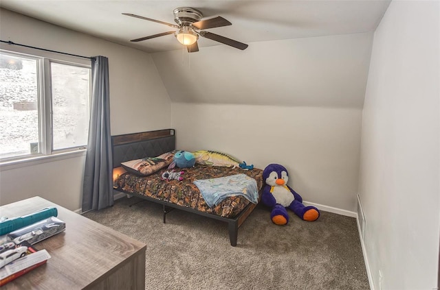 bedroom featuring vaulted ceiling, ceiling fan, carpet flooring, and baseboards