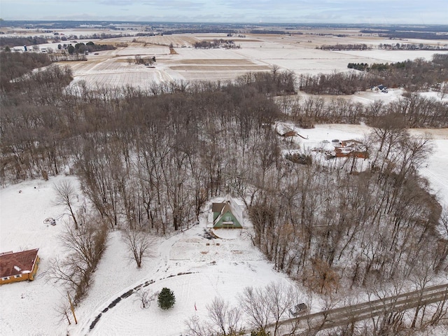 snowy aerial view featuring a rural view