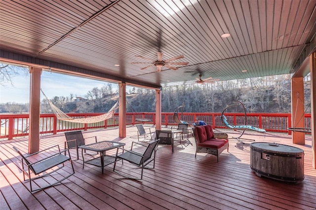 wooden deck with ceiling fan