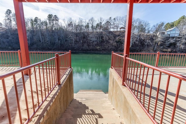 view of dock with a water view