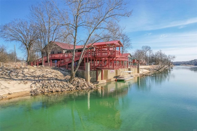 view of dock with a water view