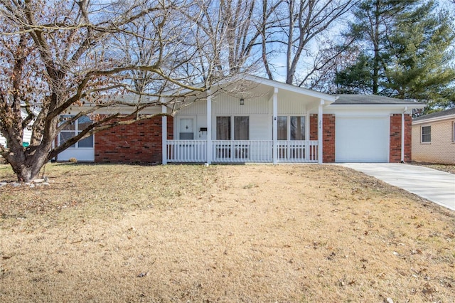 ranch-style house featuring a garage and a front lawn