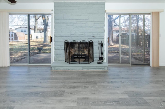 unfurnished living room featuring hardwood / wood-style floors