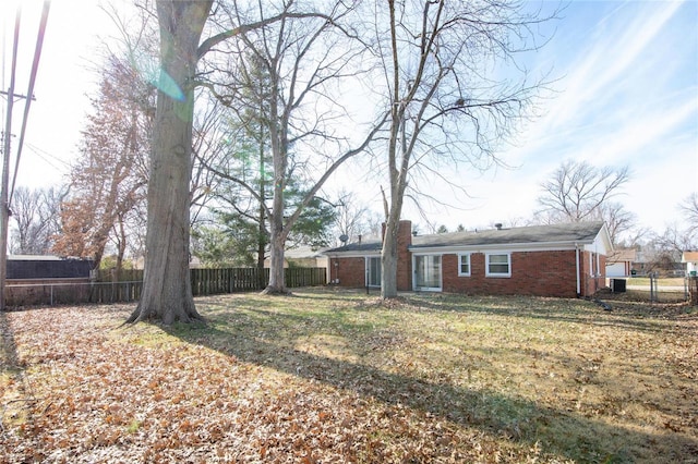 view of yard featuring fence