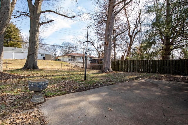 view of yard featuring a patio and fence private yard