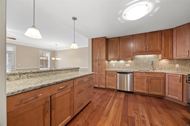 kitchen with backsplash, hanging light fixtures, stainless steel appliances, crown molding, and dark wood-type flooring