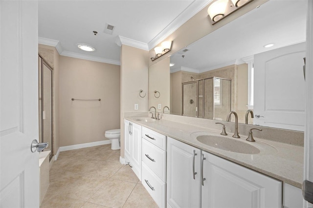 bathroom featuring a shower with door, tile patterned flooring, vanity, ornamental molding, and toilet