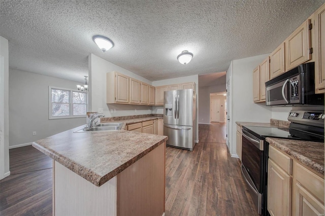 kitchen with sink, dark wood-type flooring, stainless steel appliances, and light brown cabinets