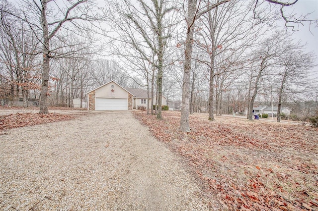 view of yard featuring a garage