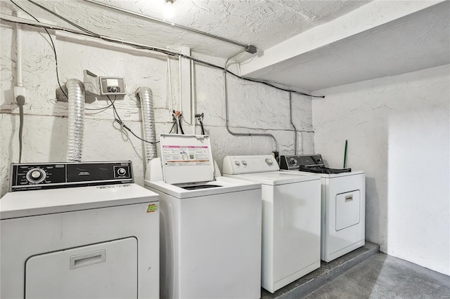 laundry room with laundry area and separate washer and dryer