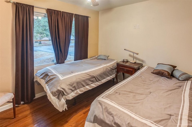 bedroom featuring wood-type flooring