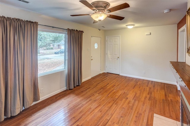 interior space featuring ceiling fan and light hardwood / wood-style flooring