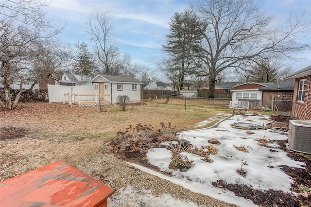 view of yard with central AC unit