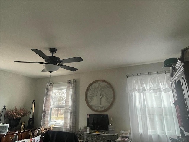 living room with ceiling fan