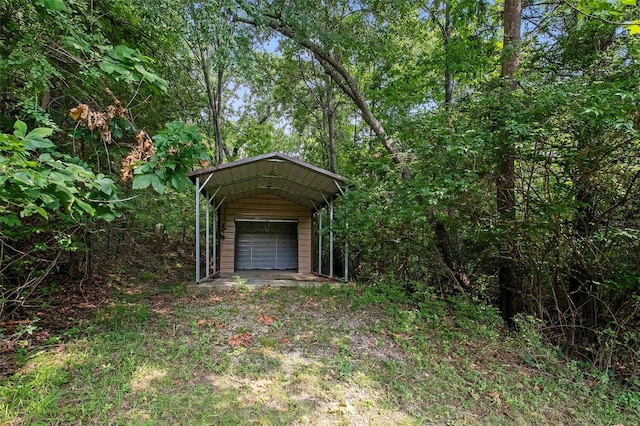 view of outbuilding with a garage