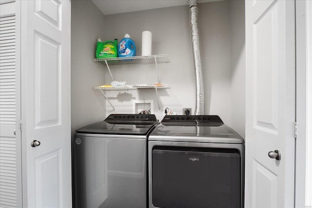 laundry area featuring washer and clothes dryer