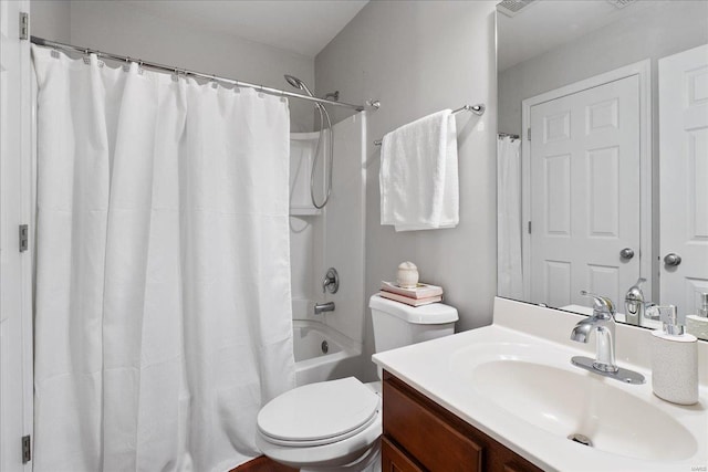 full bathroom with vanity, shower / bath combination with curtain, and toilet