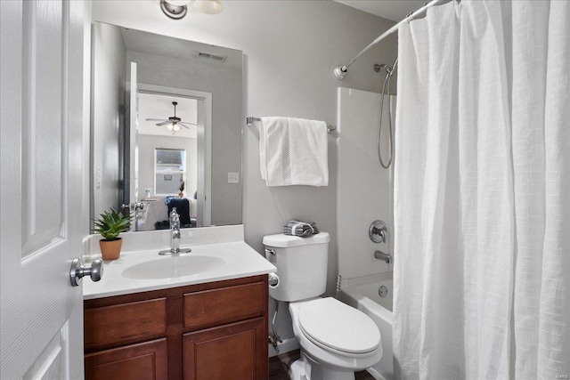 full bathroom with vanity, shower / bathtub combination with curtain, and toilet