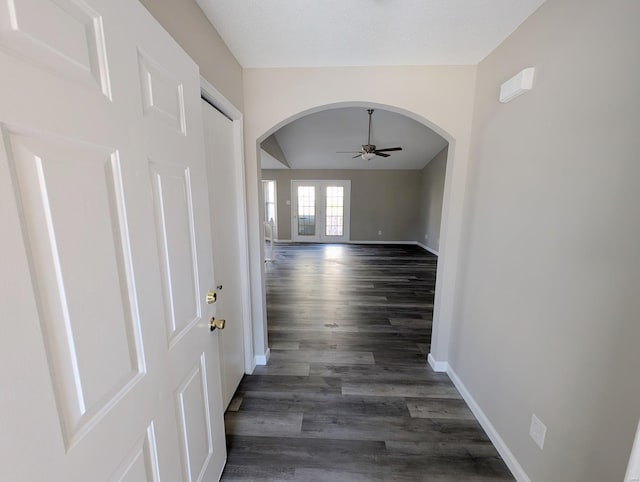 hallway featuring dark wood-type flooring