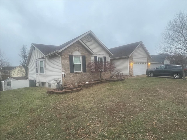 ranch-style house with central AC unit, a garage, and a front lawn