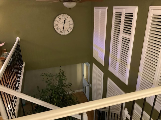 stairs with ceiling fan