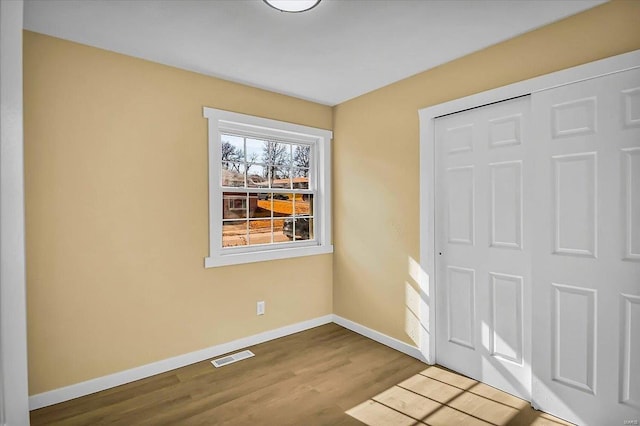 foyer entrance featuring hardwood / wood-style floors