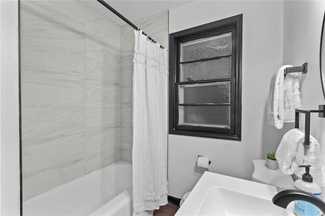 bathroom featuring shower / bath combination with curtain