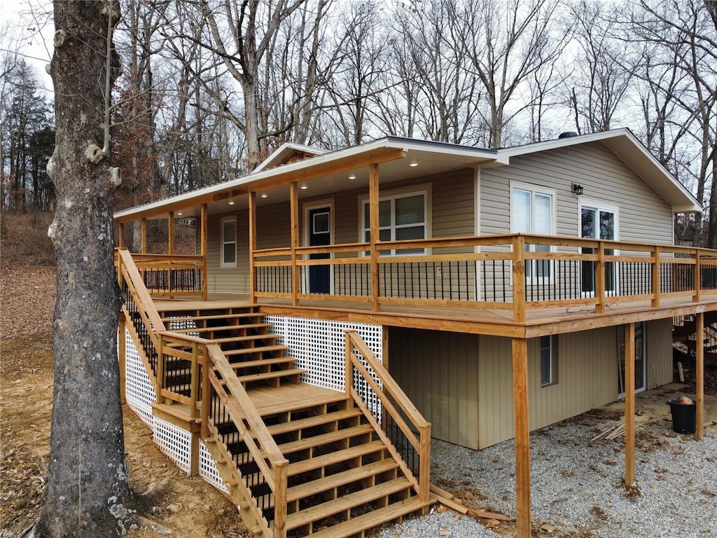 rear view of property with a deck