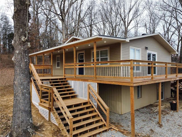 rear view of property with a deck