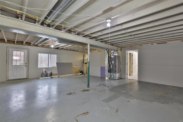 basement featuring heating unit