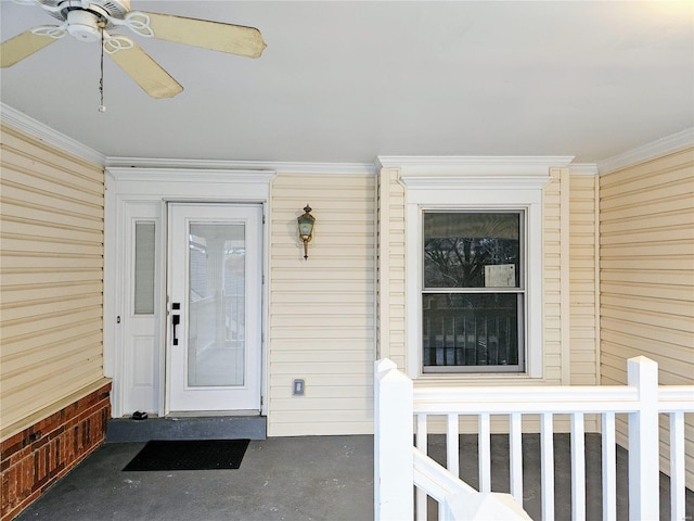 doorway to property featuring ceiling fan