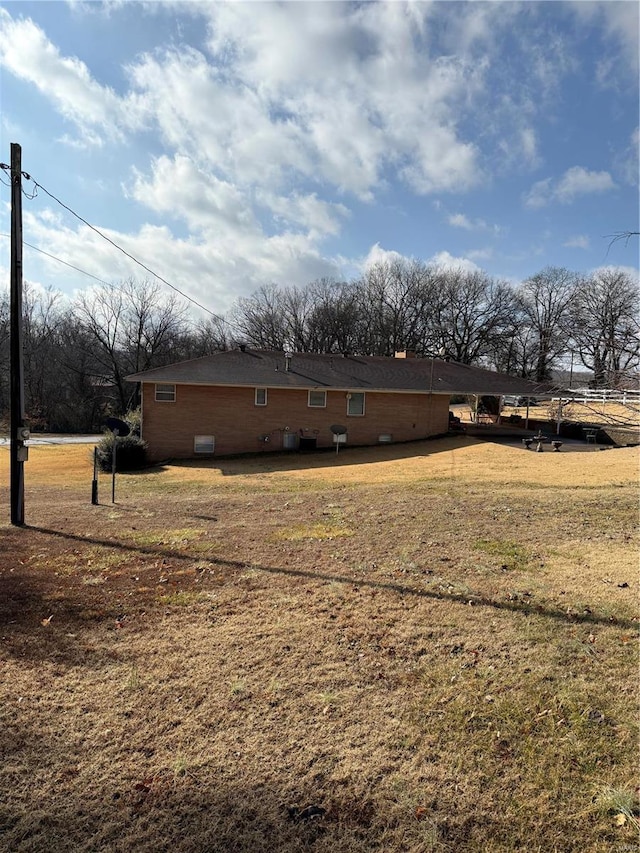 exterior space featuring a yard