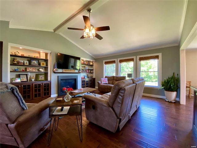 living room featuring vaulted ceiling with beams, ornamental molding, dark hardwood / wood-style flooring, built in features, and ceiling fan