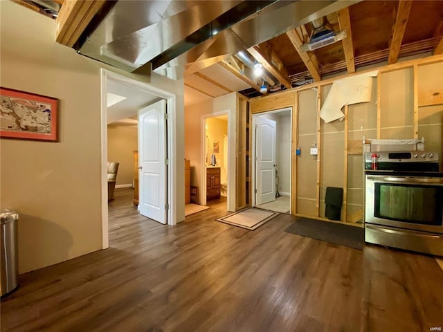 kitchen with wood-type flooring and electric range