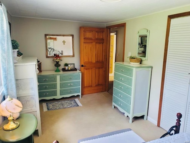 bedroom with light colored carpet