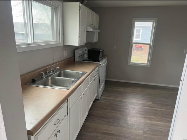 kitchen featuring sink, white electric range oven, white cabinets, and dark wood-type flooring