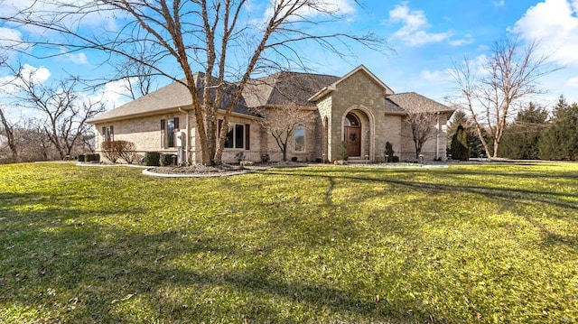 view of front of home with a front lawn