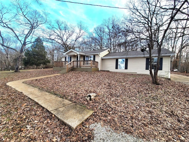 ranch-style home with covered porch