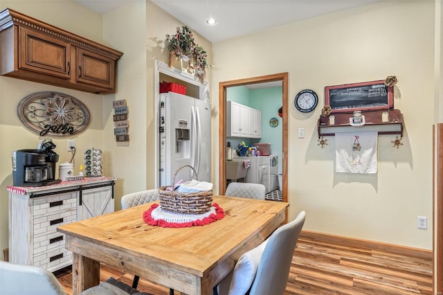 dining space featuring light hardwood / wood-style flooring