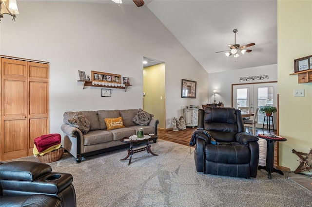 living room with high vaulted ceiling, ceiling fan, and french doors