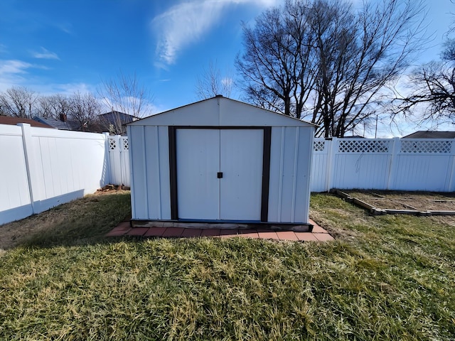 view of outbuilding featuring a yard