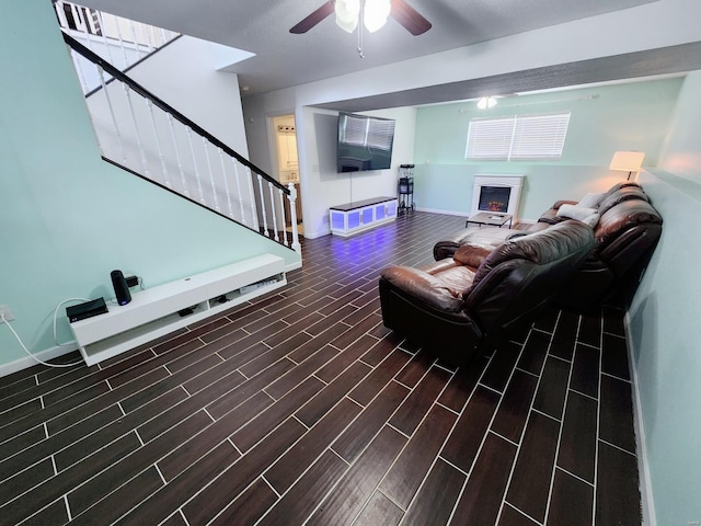 living room featuring ceiling fan