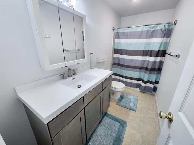 bathroom with a shower with curtain, vanity, toilet, and tile patterned flooring