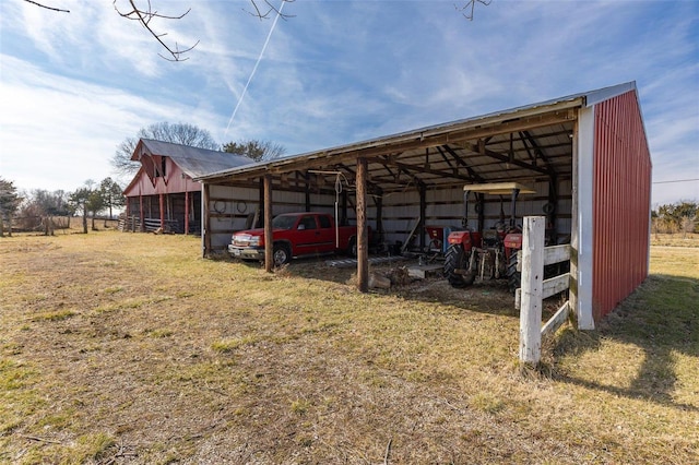 view of car parking featuring a yard