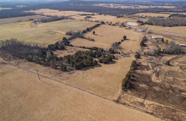 birds eye view of property featuring a rural view