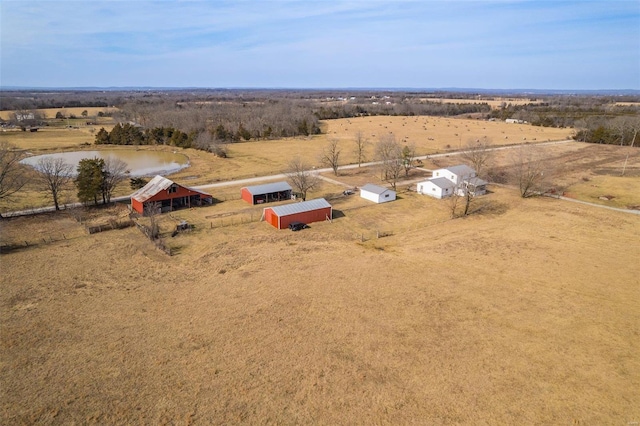 bird's eye view featuring a water view and a rural view