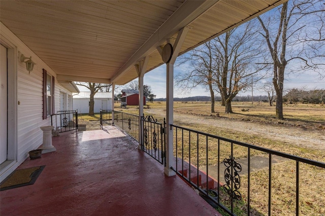 balcony with a porch and a rural view